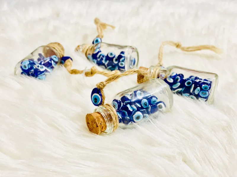 Blue Eyes and Hamsa Hands: How Ancient Protective Charms Became Gen Z's Favorite Anxiety Hack